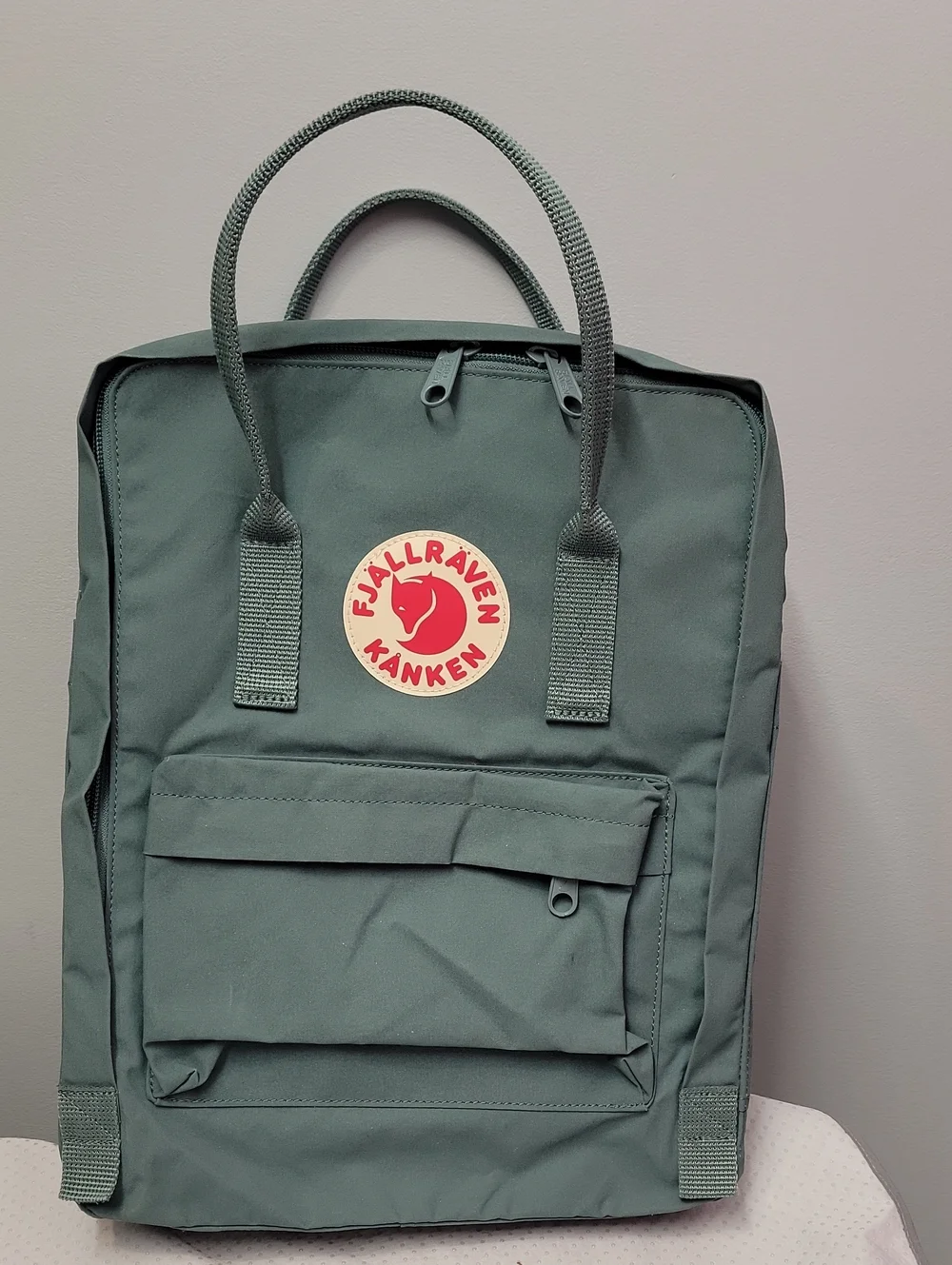 Fjallraven Kanken Backpack in Teal with Red Logo
